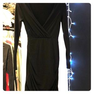 Tight mini black long sleeve dress